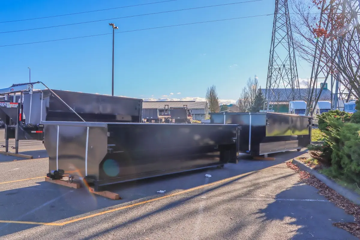 Roll-off dumpster ready for waste disposal at job site for 4 Yard Dumpster Rental in Glenpool